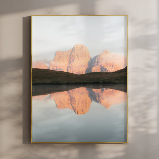 Sunrise view of Lago delle Baste with mountain reflection in the Dolomites