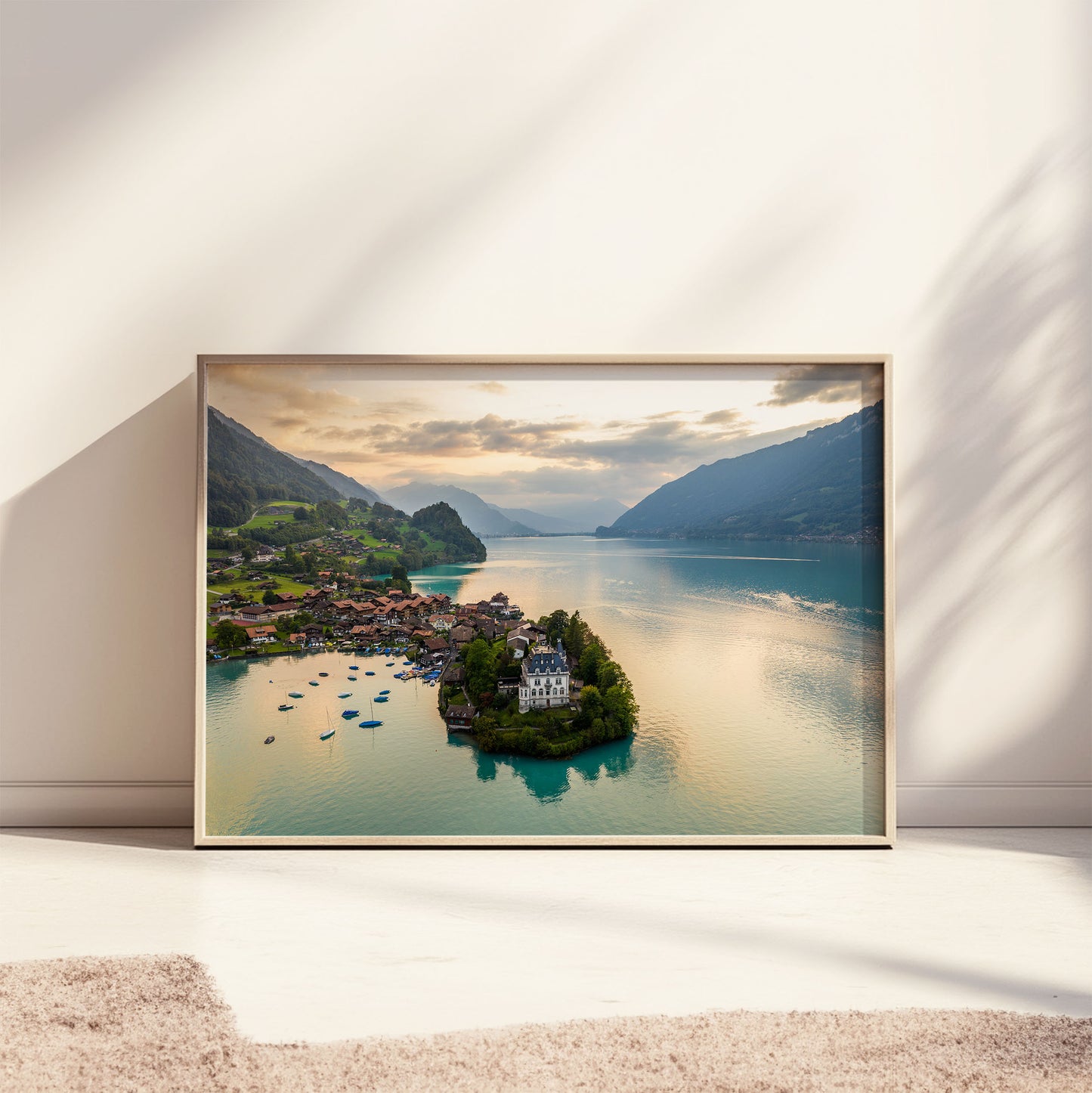 Aerial view of Iseltwald on Lake Brienz at sunrise, capturing the essence of Swiss mountain beauty.