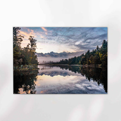 Unframed Lake Matheson fine art print on white background showing misty dawn reflection of Southern Alps in still lake surrounded by native forest