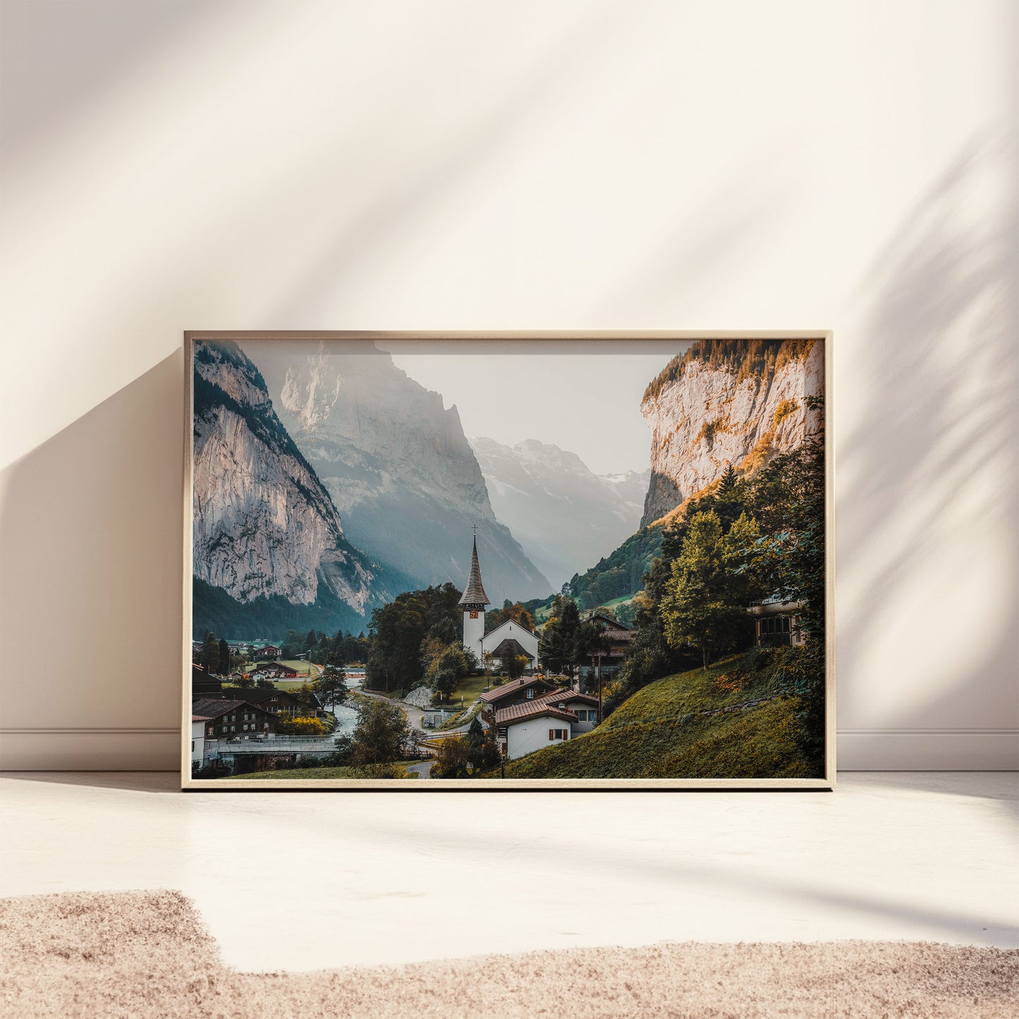 Morning light on Lauterbrunnen village with a serene mountain view, a stunning wall art piece.