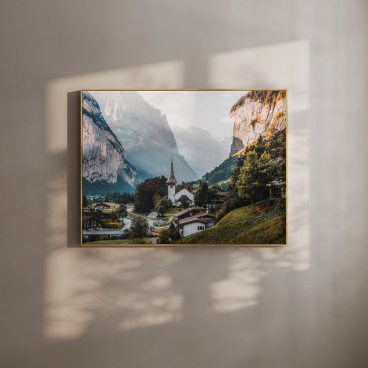 Lauterbrunnen village with a stunning mountain backdrop in the morning light, perfect nature wall art.