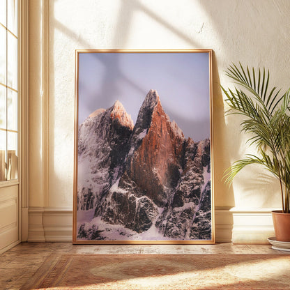 Les Drus at sunset with dramatic alpine peaks and snowy details.