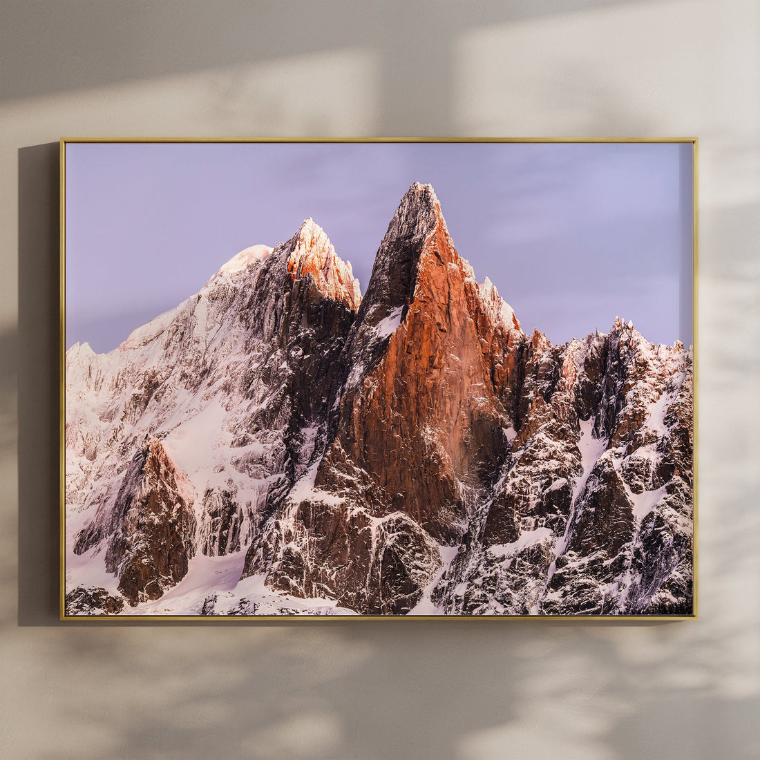 Fine art print of Les Drus at sunrise in Chamonix, France—an iconic peak glowing above the Mer de Glace in the Mont Blanc range.