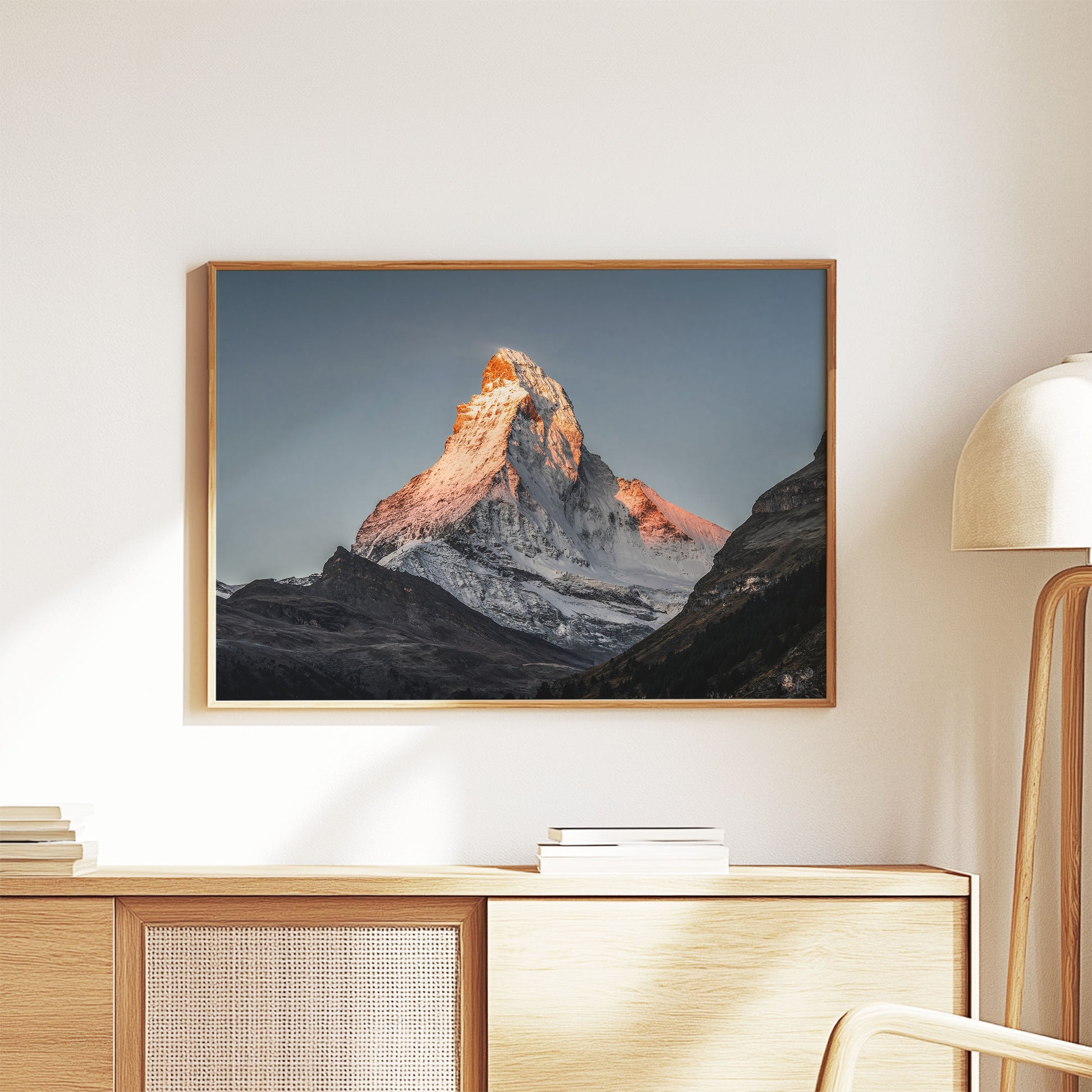 Matterhorn wall art with morning glow, elegantly styled in a living room.