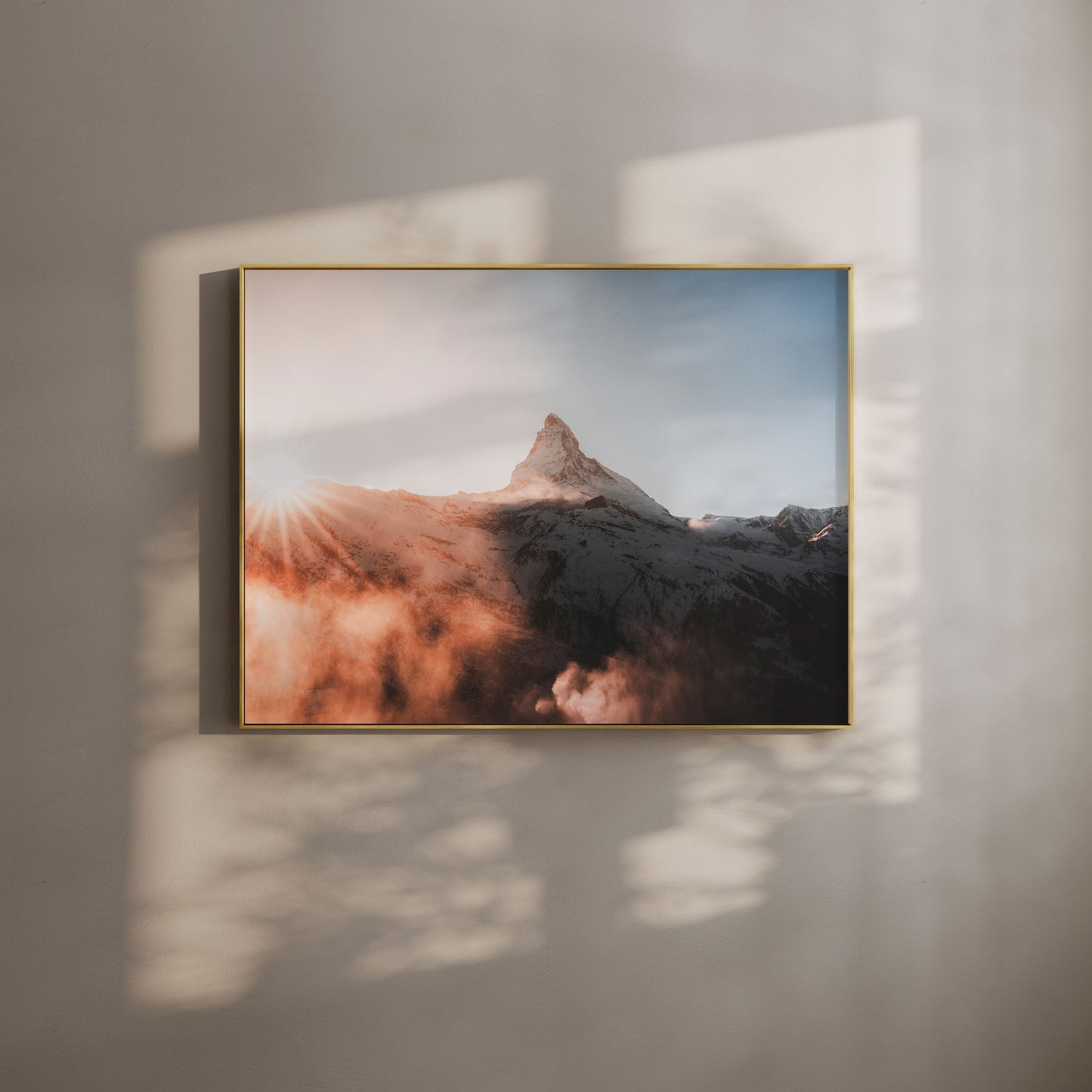 Matterhorn at sunset surrounded by glowing clouds, a captivating nature wall art piece.