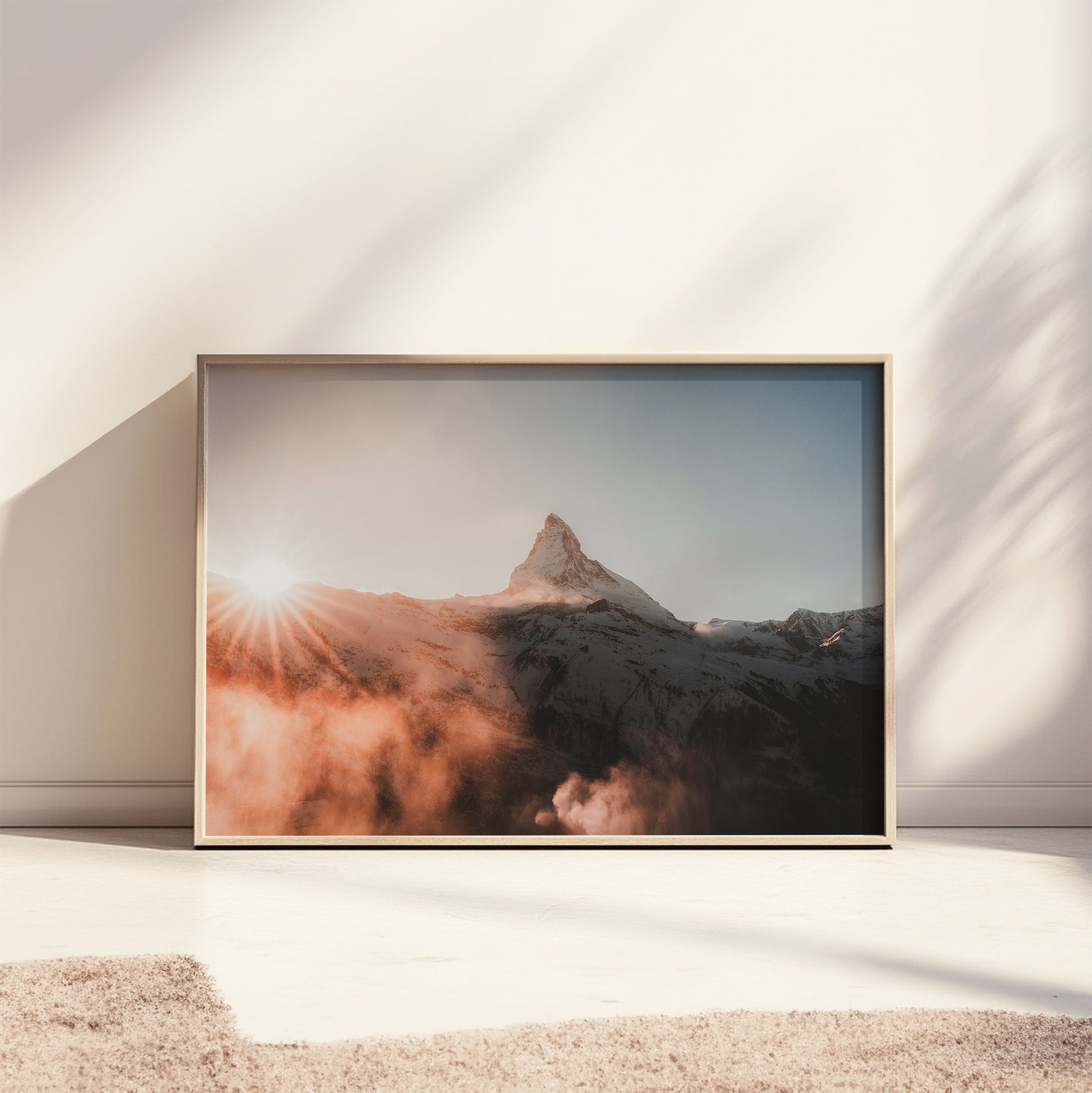 Sunlit Matterhorn at dusk framed elegantly in a minimalist room setup.