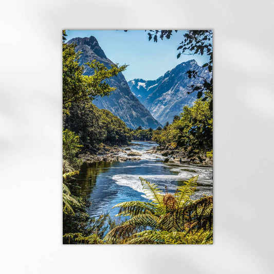 Unframed photography print of Milford Track Fiordland New Zealand river and mountains on white background