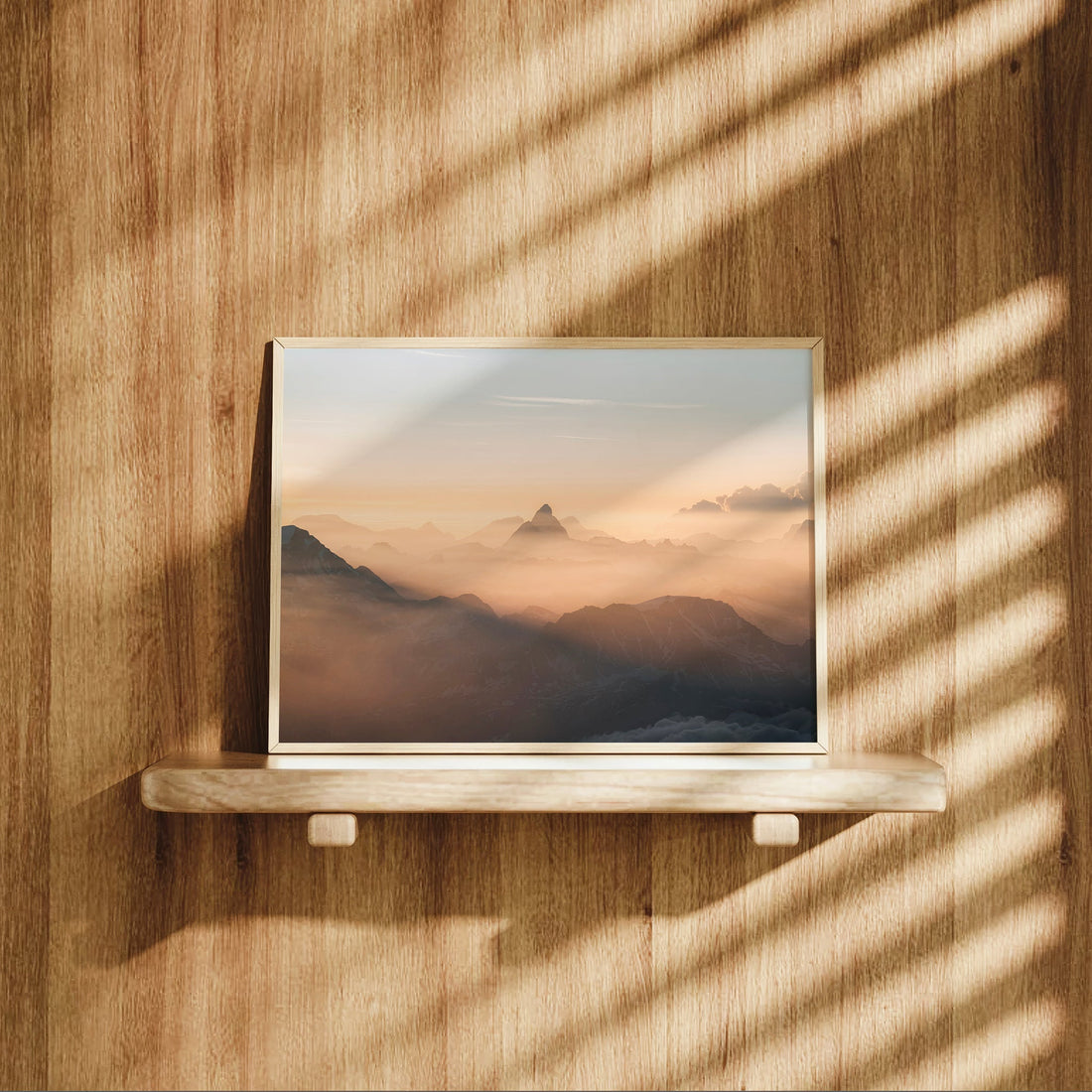 Minimalist landscape print of the Matterhorn at sunrise with warm pastel light and soft mountain haze.