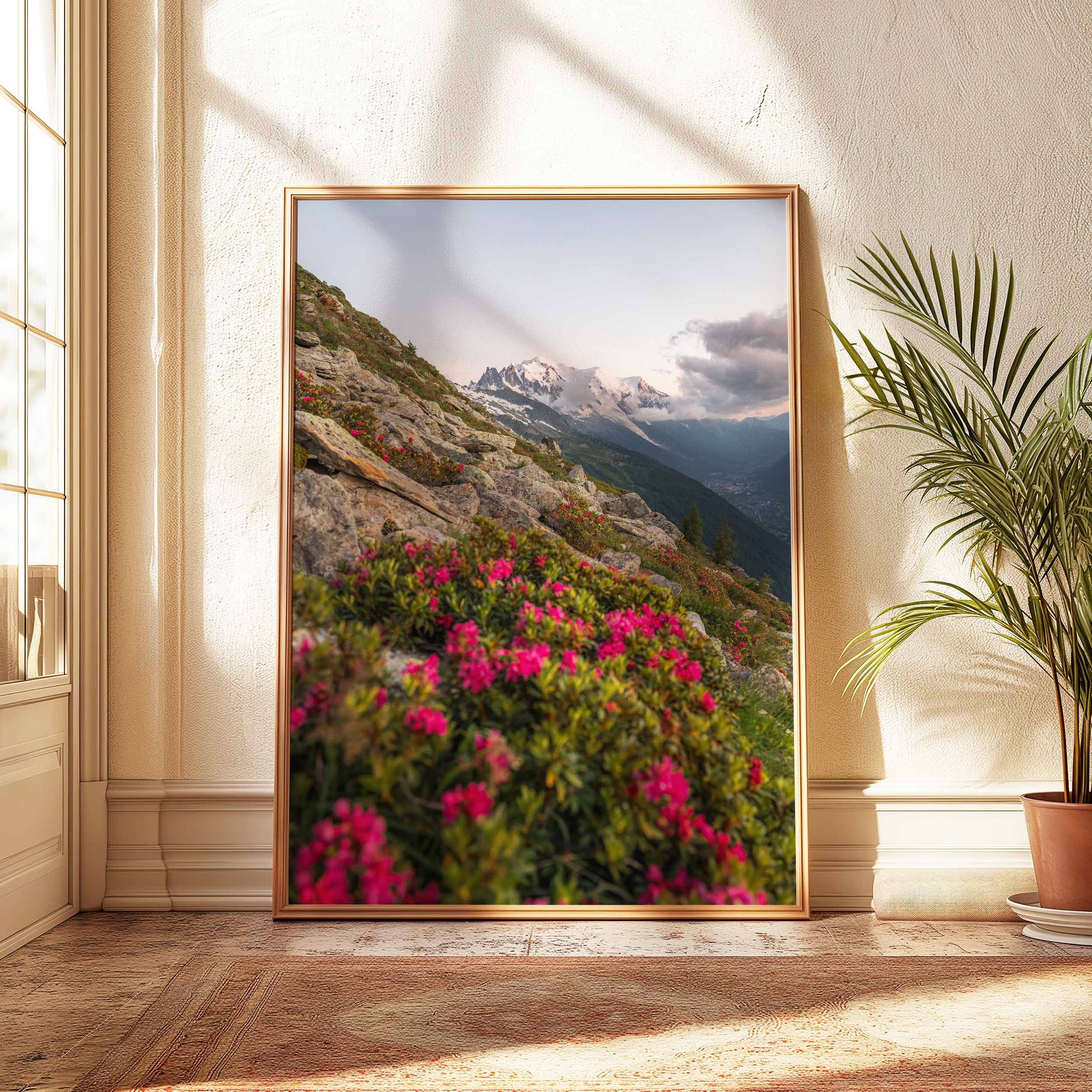 Captivating view of the Mont Blanc massif surrounded by vivid alpine flowers.