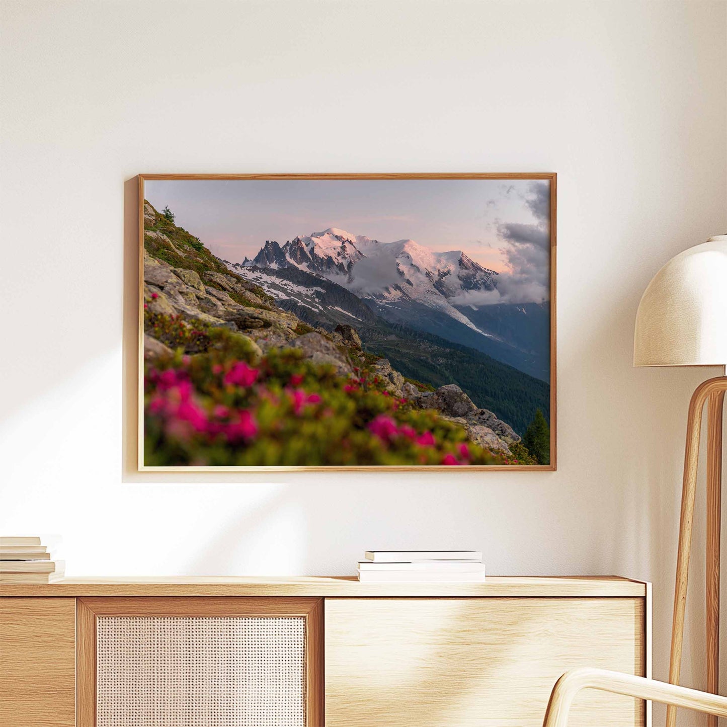 Sunset glow on Mont Blanc massif surrounded by pink alpine flowers