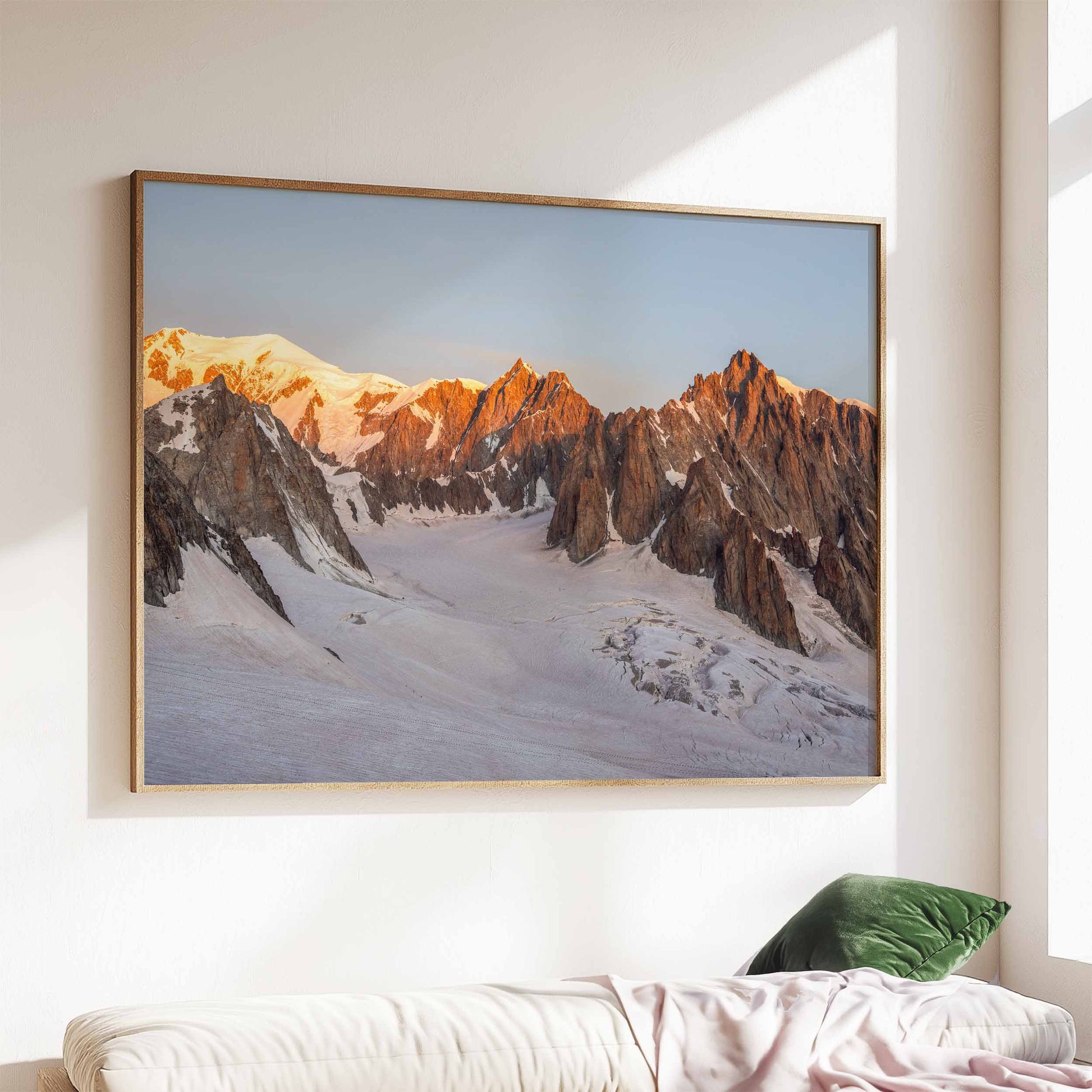 A breathtaking view of Mont Blanc, Mont Maudit, and Mont Blanc du Tacul during sunrise, ideal for mountain-inspired wall decor.