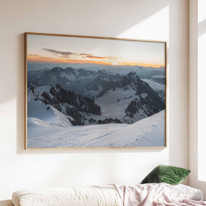 Sunset over Mont Blanc with snow and mountain shadows captured in a cozy living room