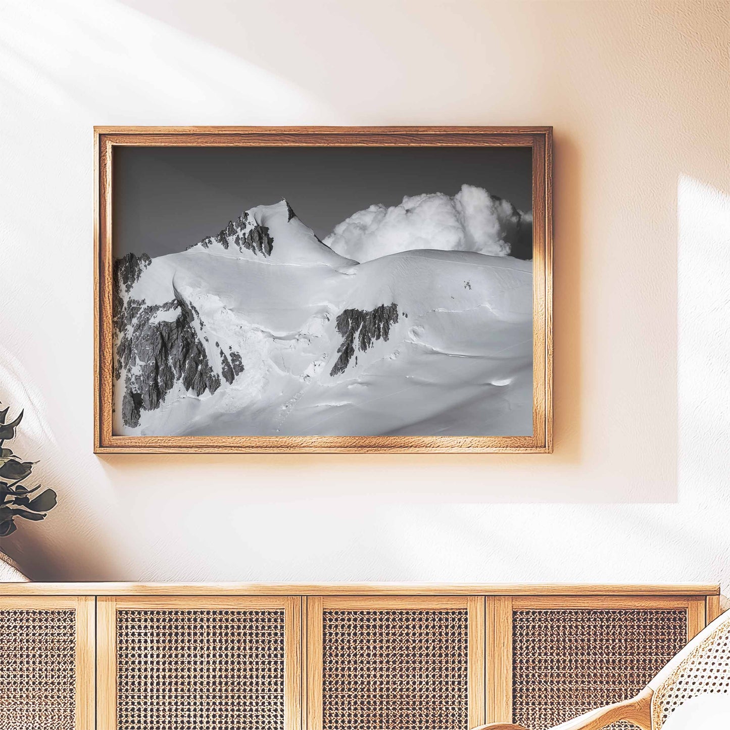 Stylish black and white artwork of Mont Maudit mounted in a cozy wooden frame, highlighting its snowy peaks.