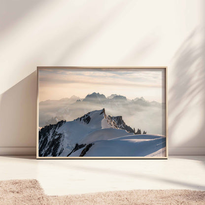 Mont Maudit summit with misty mountain ranges, framed art resting on a sunlit floor.