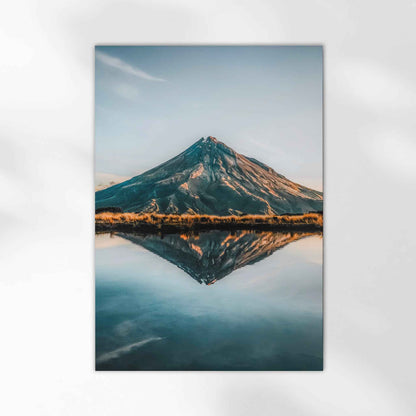 Unframed Mount Taranaki fine art print on white background showing perfect volcano reflection in still alpine lake
