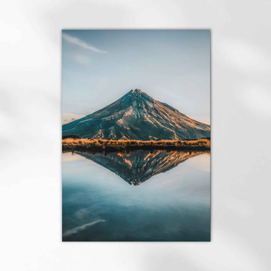 Unframed Mount Taranaki fine art print on white background showing perfect volcano reflection in still alpine lake