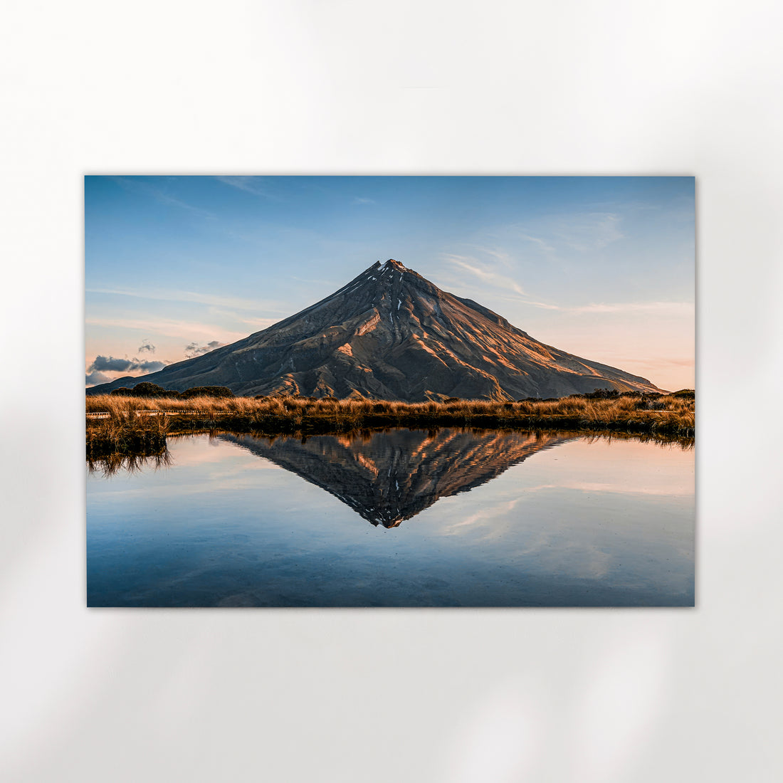 Unframed Mount Taranaki volcano reflection fine art print on white background showing perfect symmetrical tarn reflection at golden hour