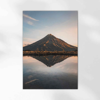 Unframed Mount Taranaki sunset fine art print on white background showing golden hour volcano reflection in still alpine tarn