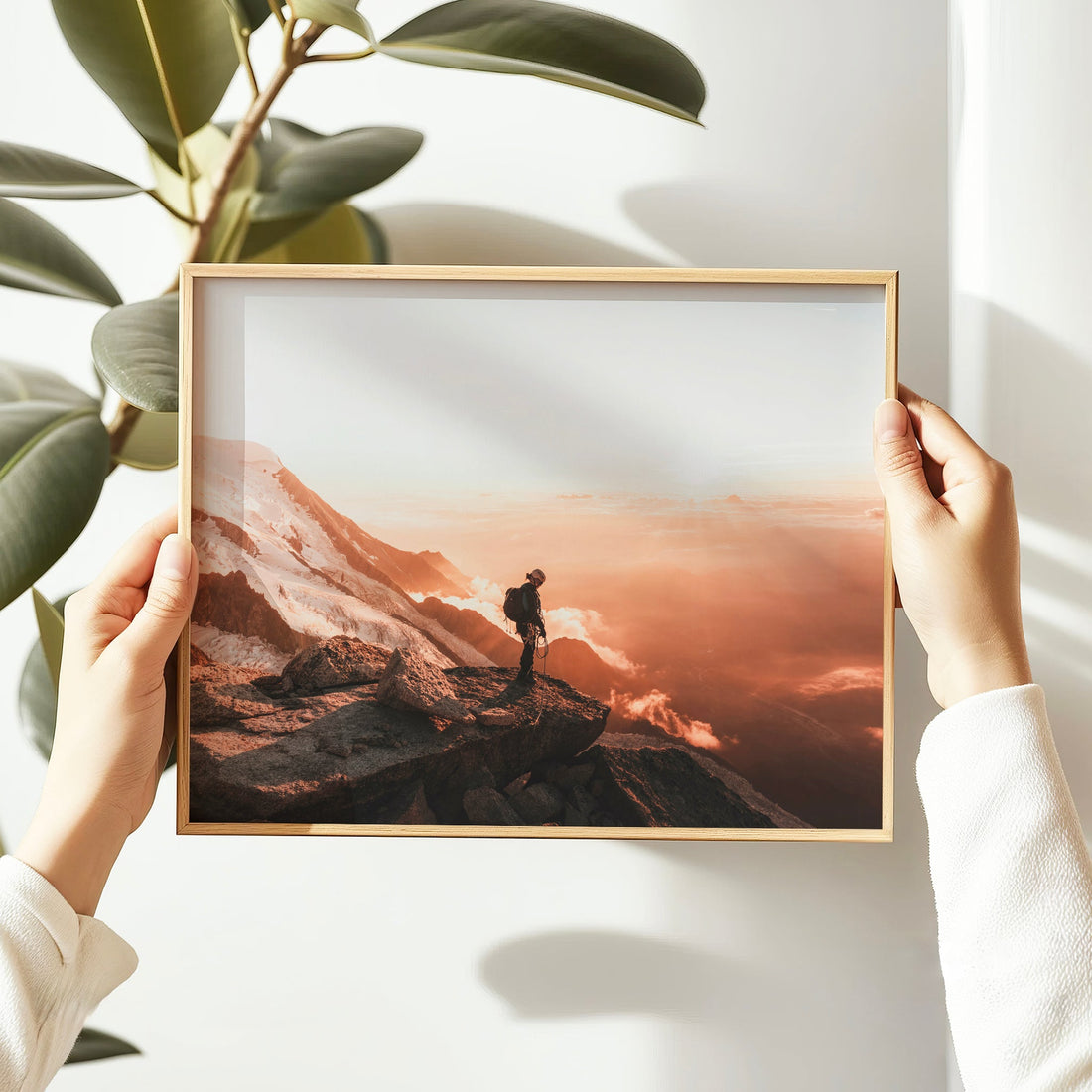  Mountain hiker sunset photography print capturing the warm glow over Mont Blanc’s icy slopes.