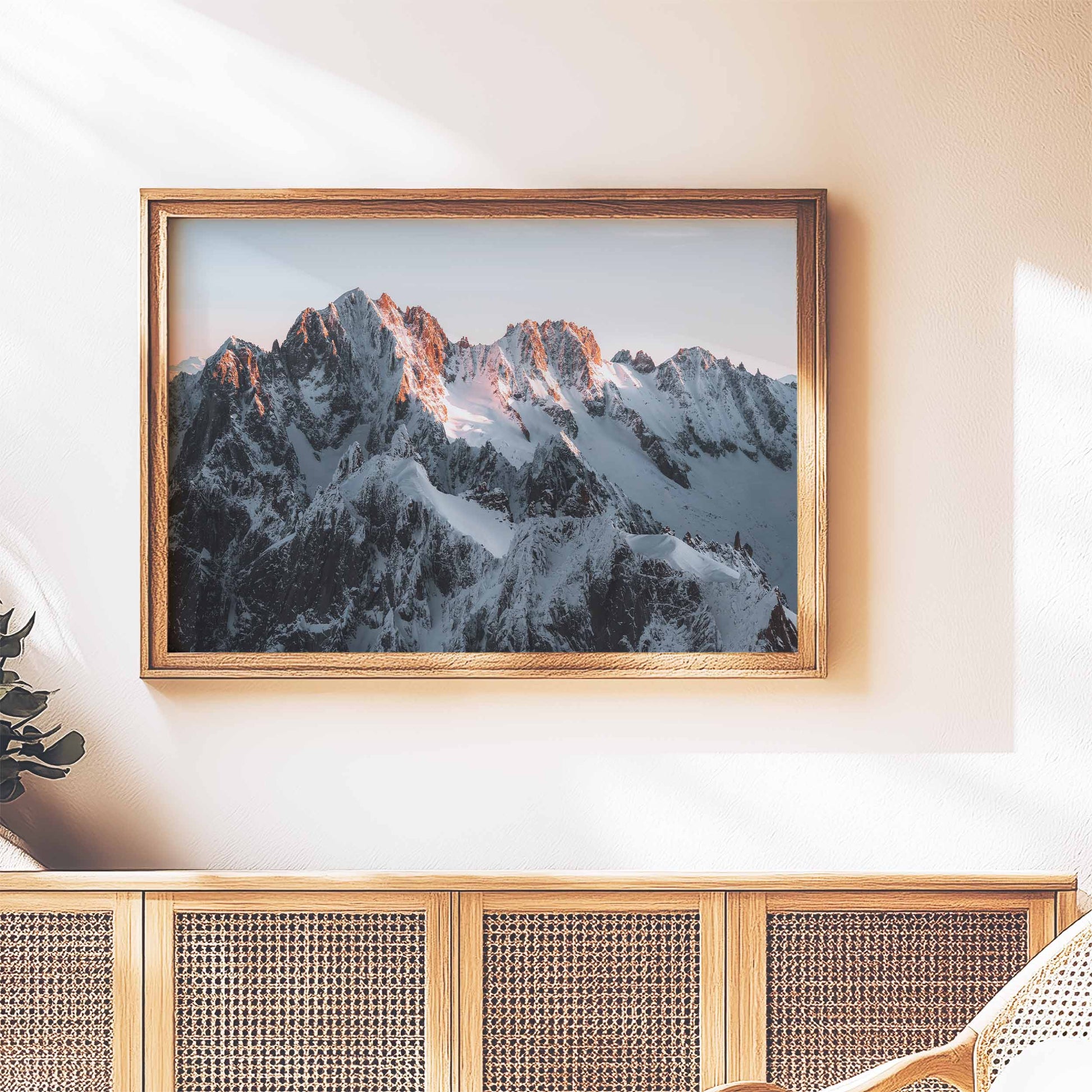 Framed wall art of the rugged mountain peaks around Chamonix in soft morning light