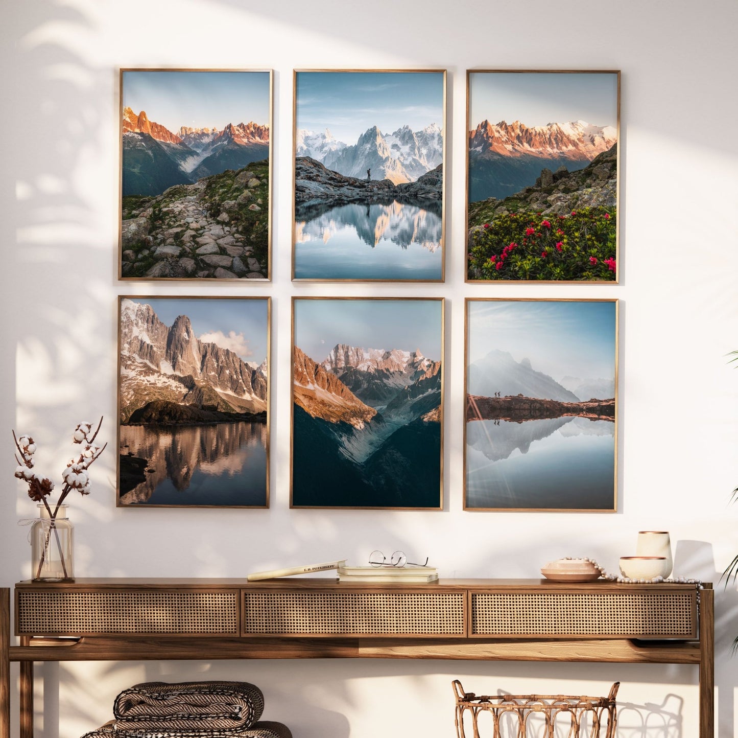 Living room setup with six alpine-themed framed prints on the wall.