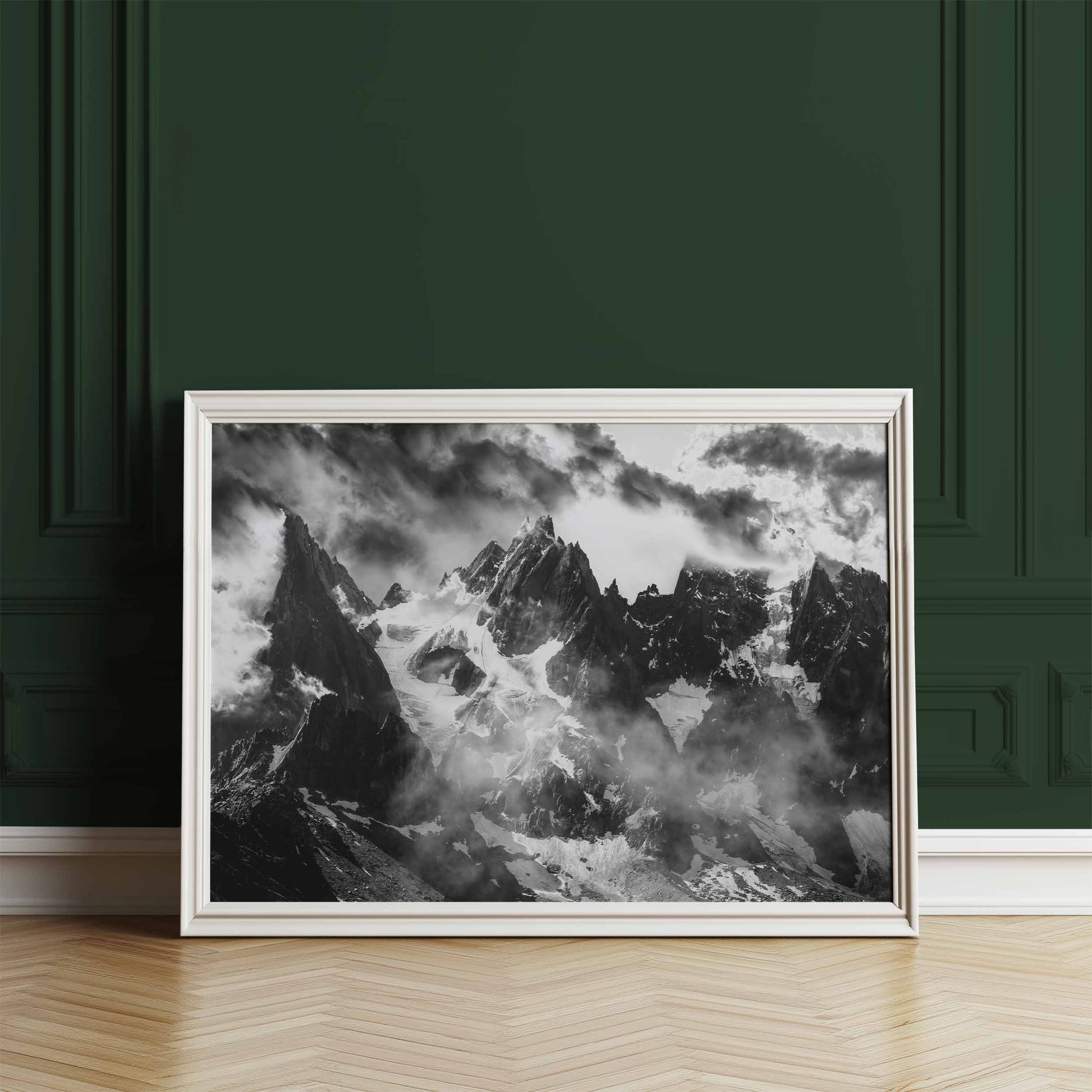 Framed black and white art print of Chamonix's iconic mountain peaks, showcasing the dramatic beauty of the Alps.