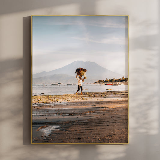 Nusa Lembongan seaweed farmer beach wall art print with Mount Agung in gold floating frame mounted on beige wall with natural shadows