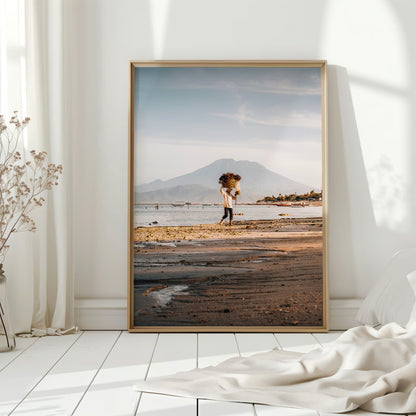 Nusa Lembongan seaweed farmer large framed wall art print in natural wood frame leaning against white wall with dried flowers