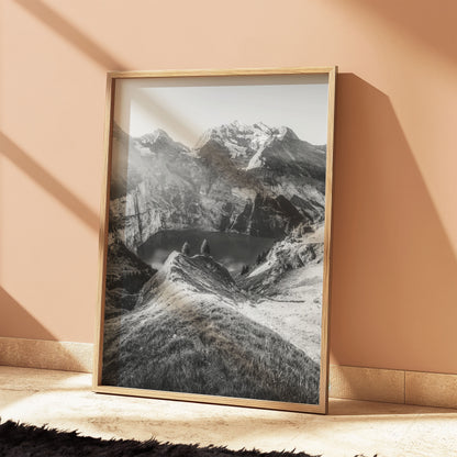 Oeschinensee lake and surrounding Swiss Alps captured in black-and-white during the evening, ideal for minimalist or nature-inspired wall decor.