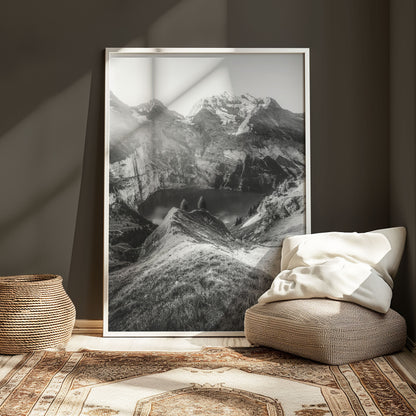 Monochrome landscape of Oeschinensee lake nestled in the Swiss Alps, showcasing dramatic mountains and evening light, perfect for nature wall art.