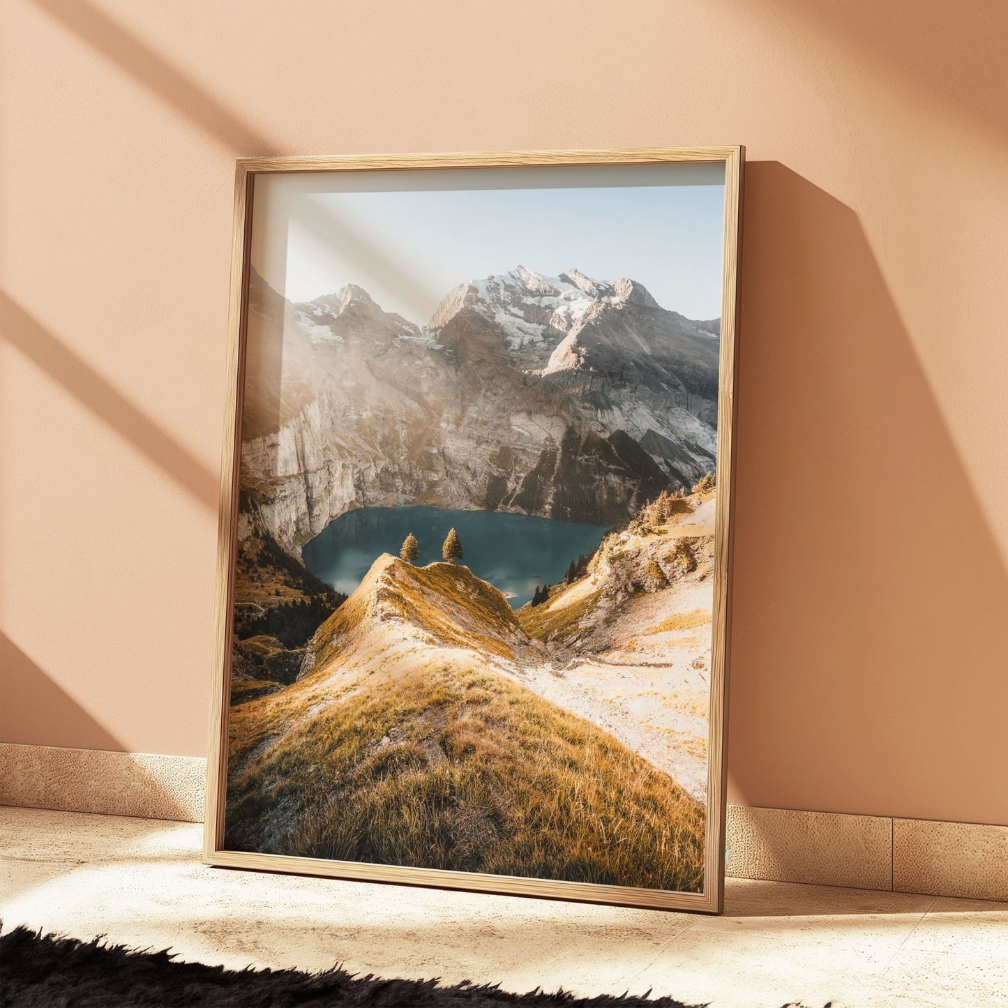 Rustic oak-framed artwork of Oeschinensee and Swiss Alps, showcasing golden light and natural beauty.