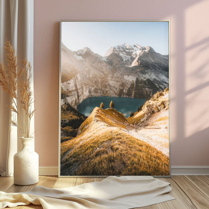 Tranquil morning view of Oeschinensee and alpine peaks, set in a silver frame for a modern touch.