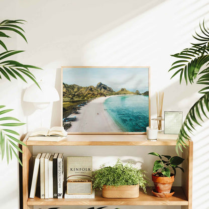 Pink Beach Padar Island Komodo National Park large framed wall art print in natural wood frame on bookshelf with plants and Kinfolk book