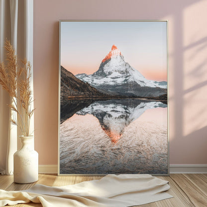 Riffelsee’s serene reflection of the Matterhorn in the morning, elegantly framed in silver.