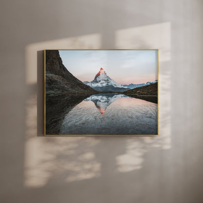 Rifflesee lake and Matterhorn mountain reflecting under morning light in the Swiss Alps, perfect for mountain wall art.