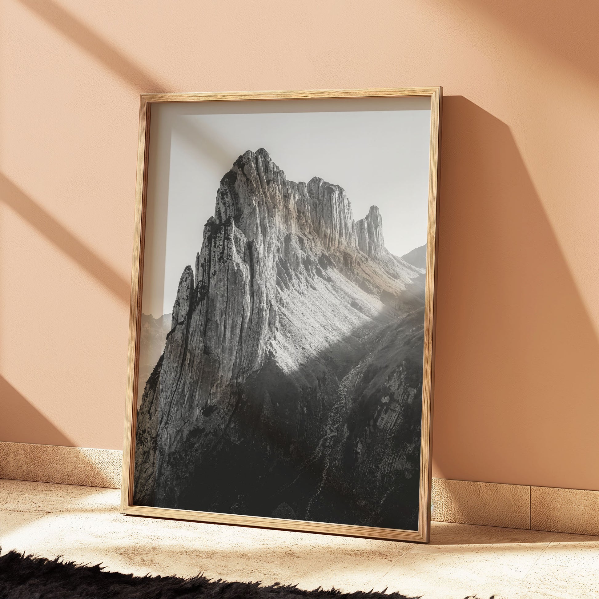 Black-and-white Saxer Lücke ridgeline in soft evening light, highlighting dramatic alpine cliffs for elegant mountain wall decor.