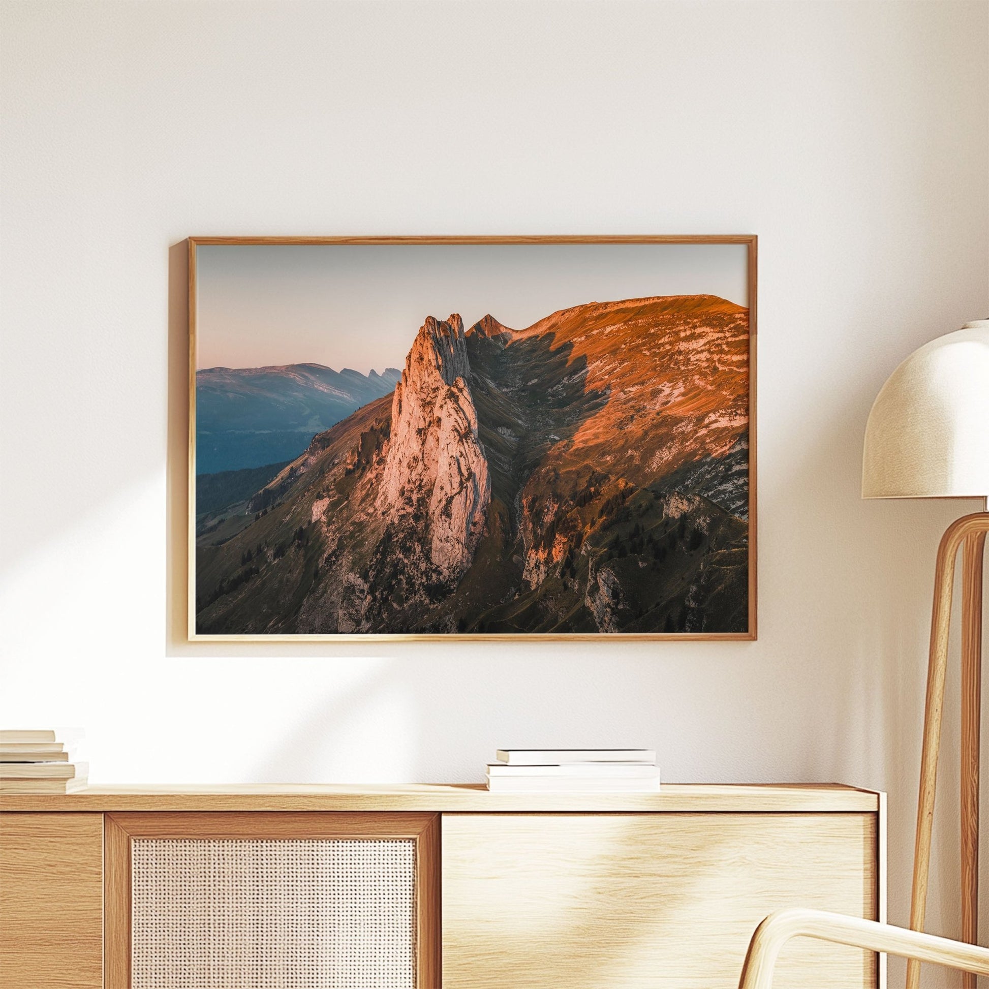 Golden morning light casting shadows across the rugged peaks of Saxer Lucke, Switzerland.