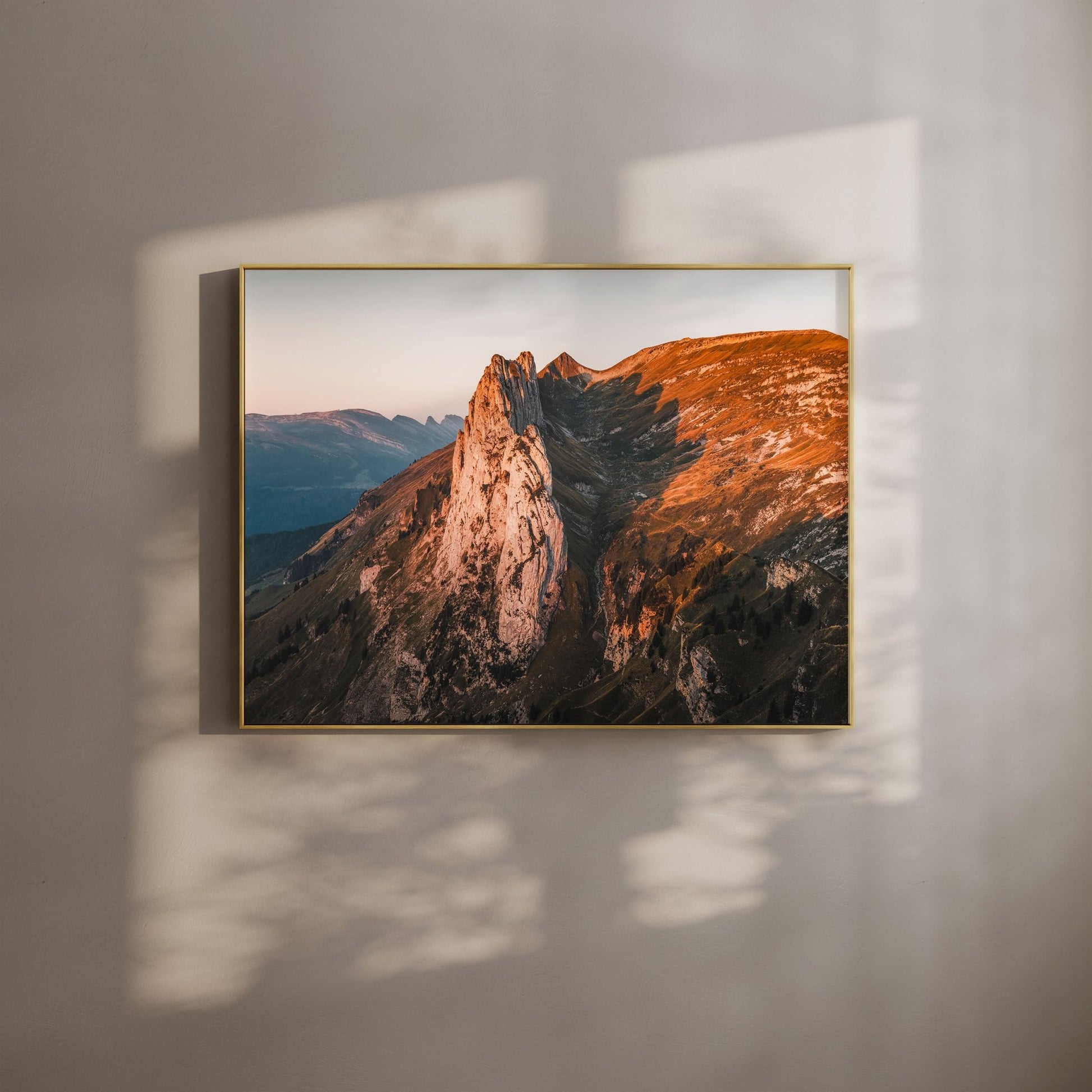 Saxer Lucke mountain peaks illuminated by warm morning light in Appenzell, Switzerland.