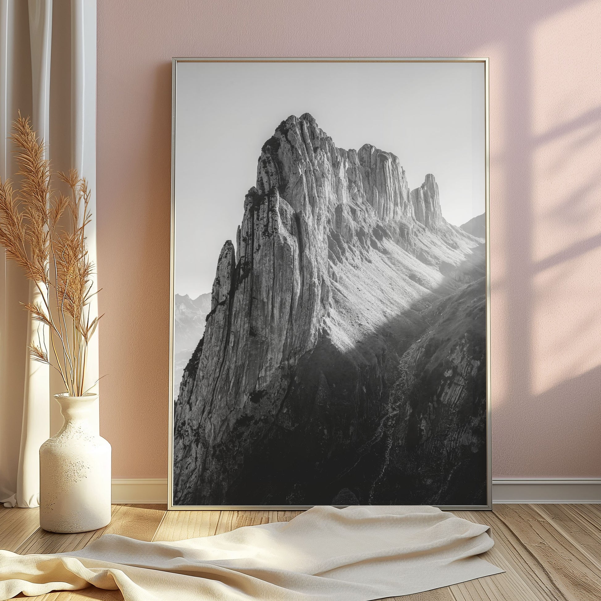 Saxer Lücke in the Swiss Alps, captured in black-and-white with evening shadows accentuating its rugged landscape, perfect for alpine wall art.