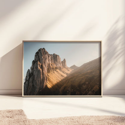 Saxer Lucke wall art showcasing Swiss Alps’ breathtaking peaks and serene golden hues.