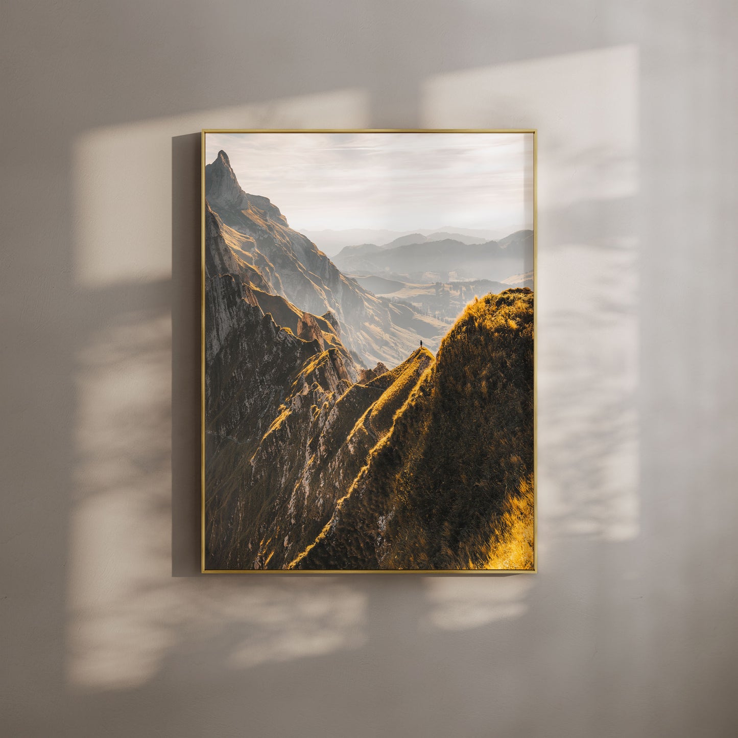 Schäfler ridgeline in Appenzell, Switzerland, with golden evening light on rugged mountain peaks, perfect for mountain wall art.