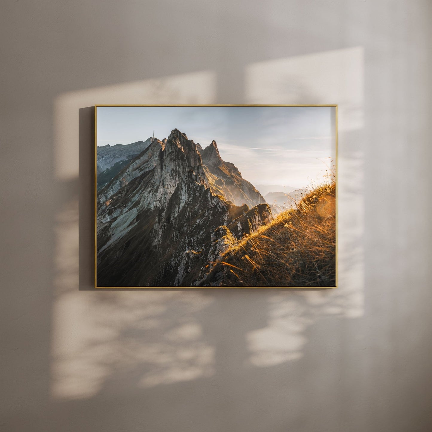 Schafler Ridgeline in Appenzell, Switzerland, illuminated by golden evening light.