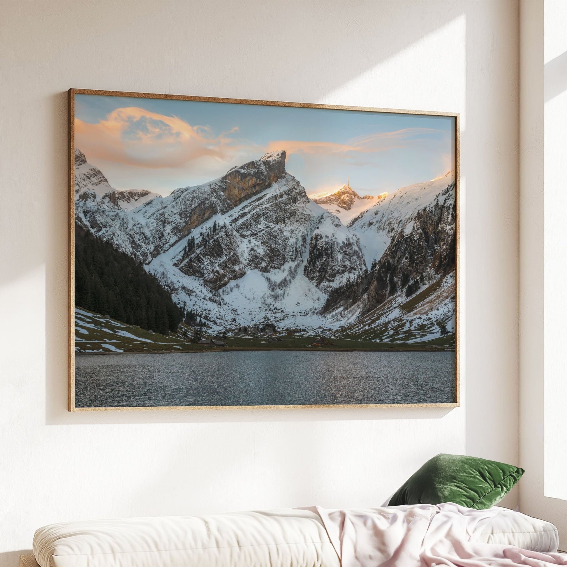 Seealpsee in winter with snow-covered peaks and serene lake reflections, Appenzell, Switzerland.