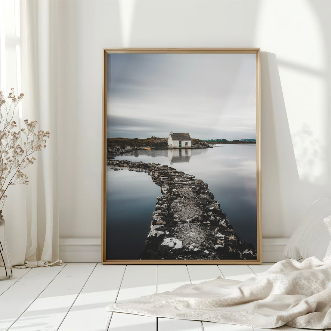Irish coastal hut print in soft light with curtains and white flooring