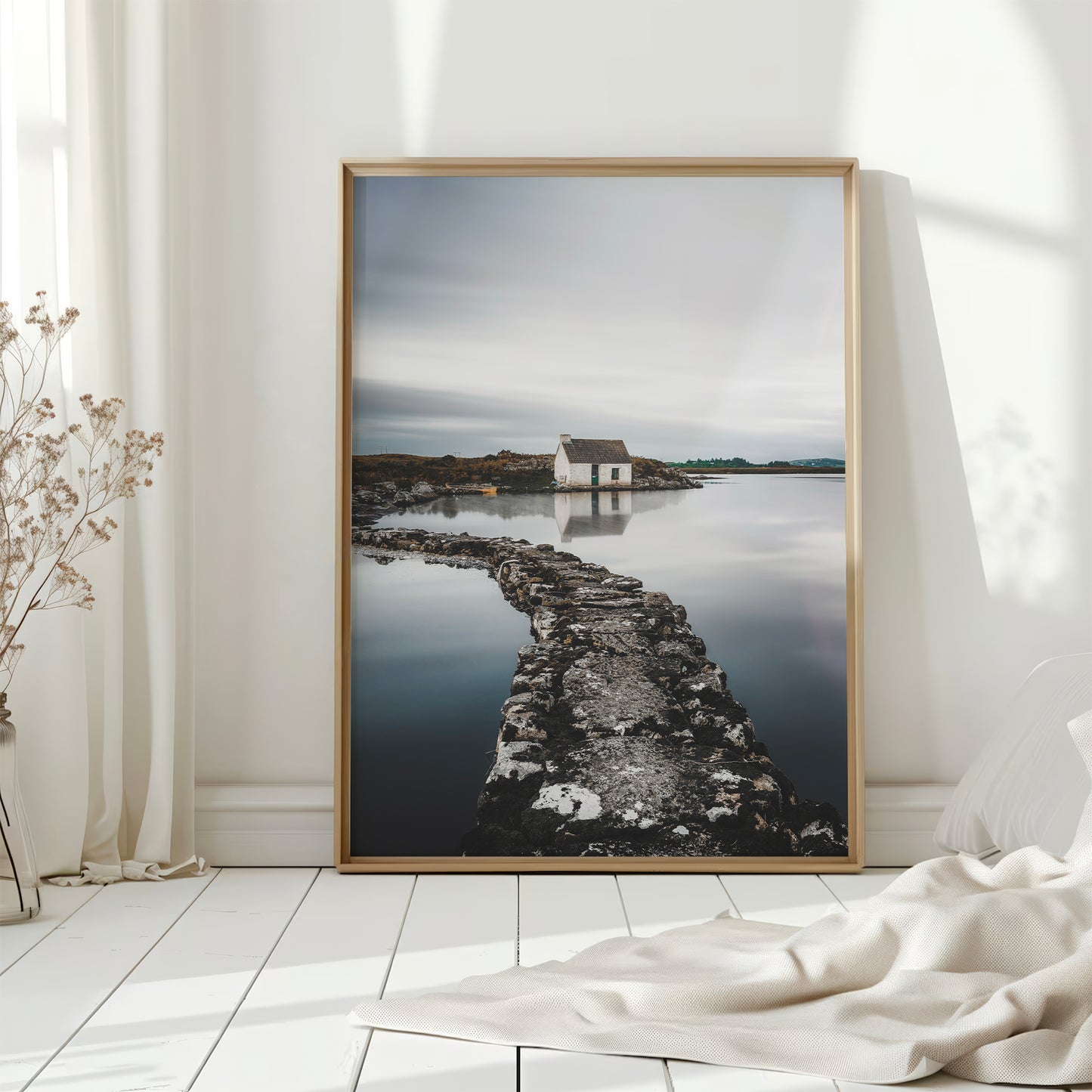 Irish coastal hut print in soft light with curtains and white flooring