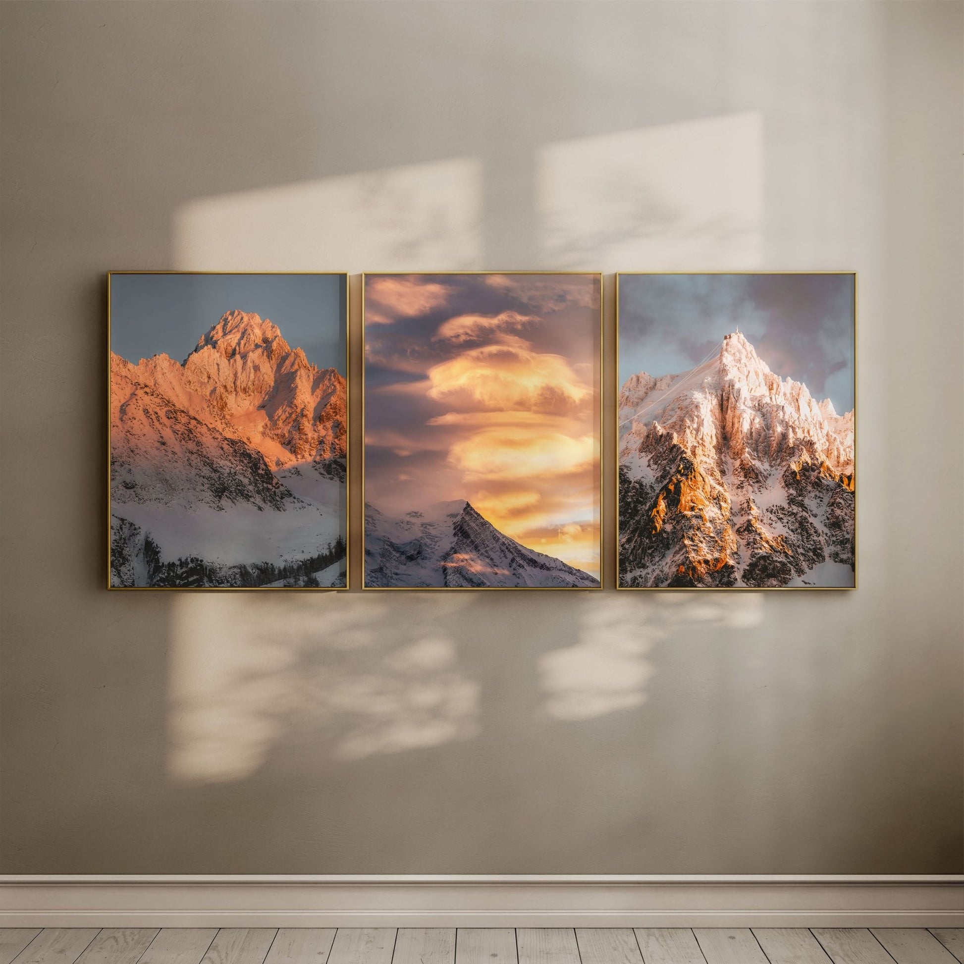 Gallery wall featuring a set of 3 French Alps prints, highlighting Aiguille du Chardonnet, Aiguille du Gouter, and Aiguille du Midi.