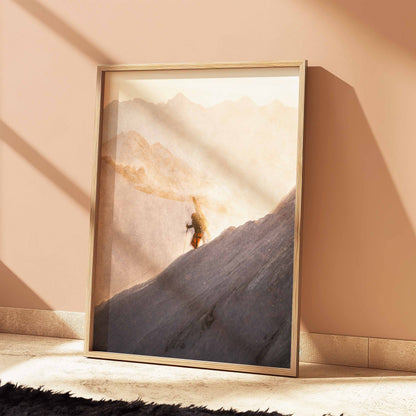 Scenic wall art of a skier climbing the Midi Arete in Chamonix, framed in natural wood.