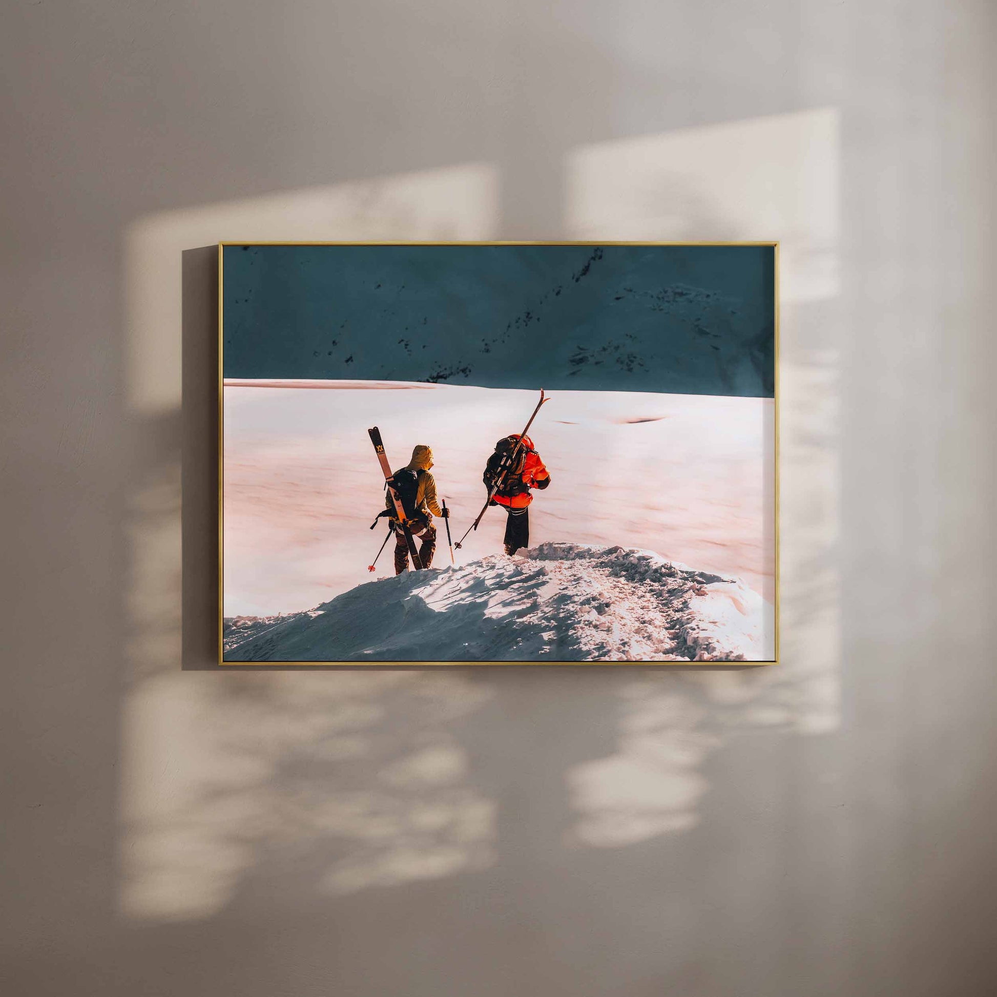 Skiers on the Midi Arête in Chamonix, wall art in a gold frame with dramatic lighting.