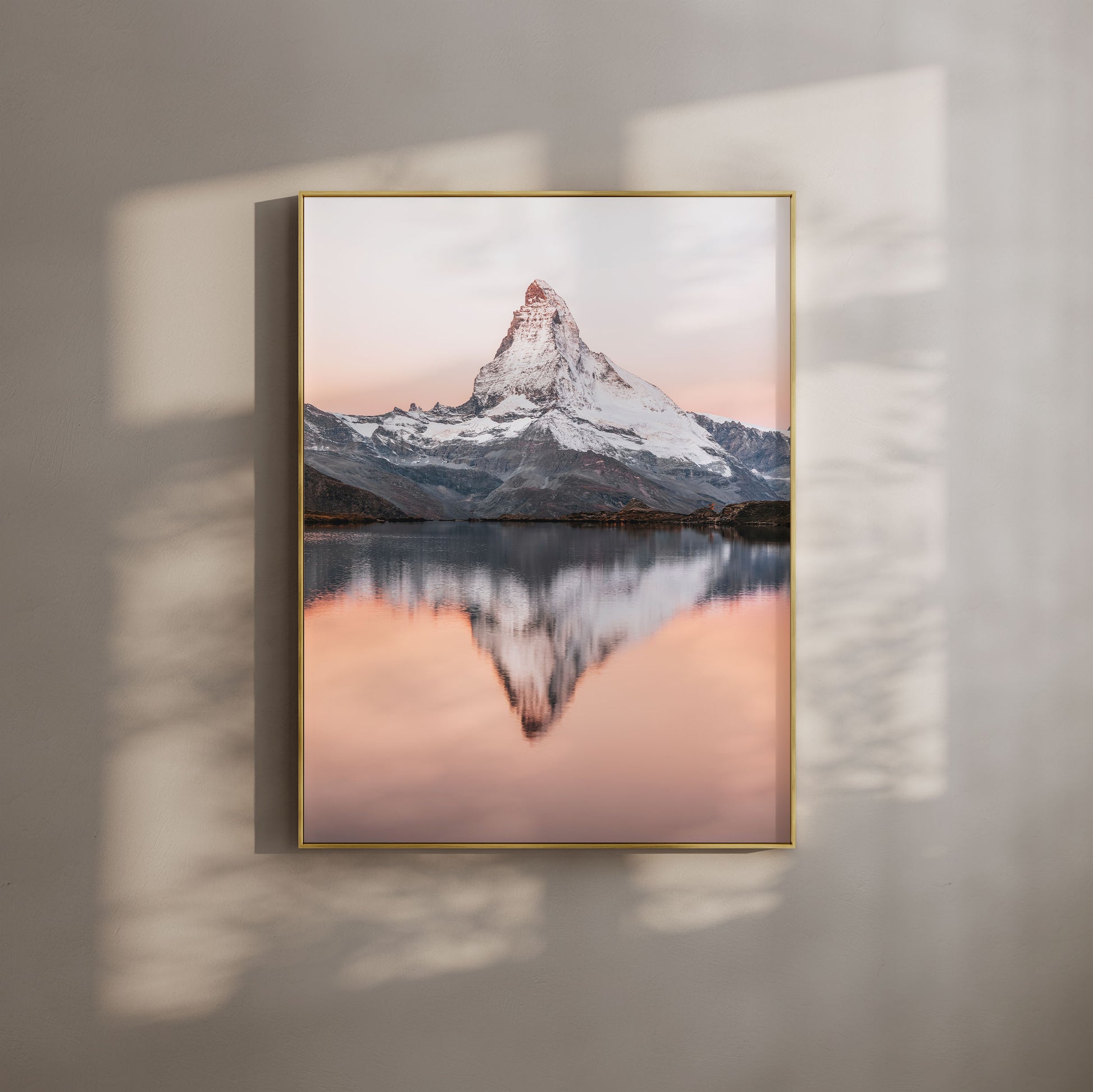 Morning sunrise at Stellisee with the Matterhorn's reflection on the still alpine lake, perfect for nature-inspired wall art.