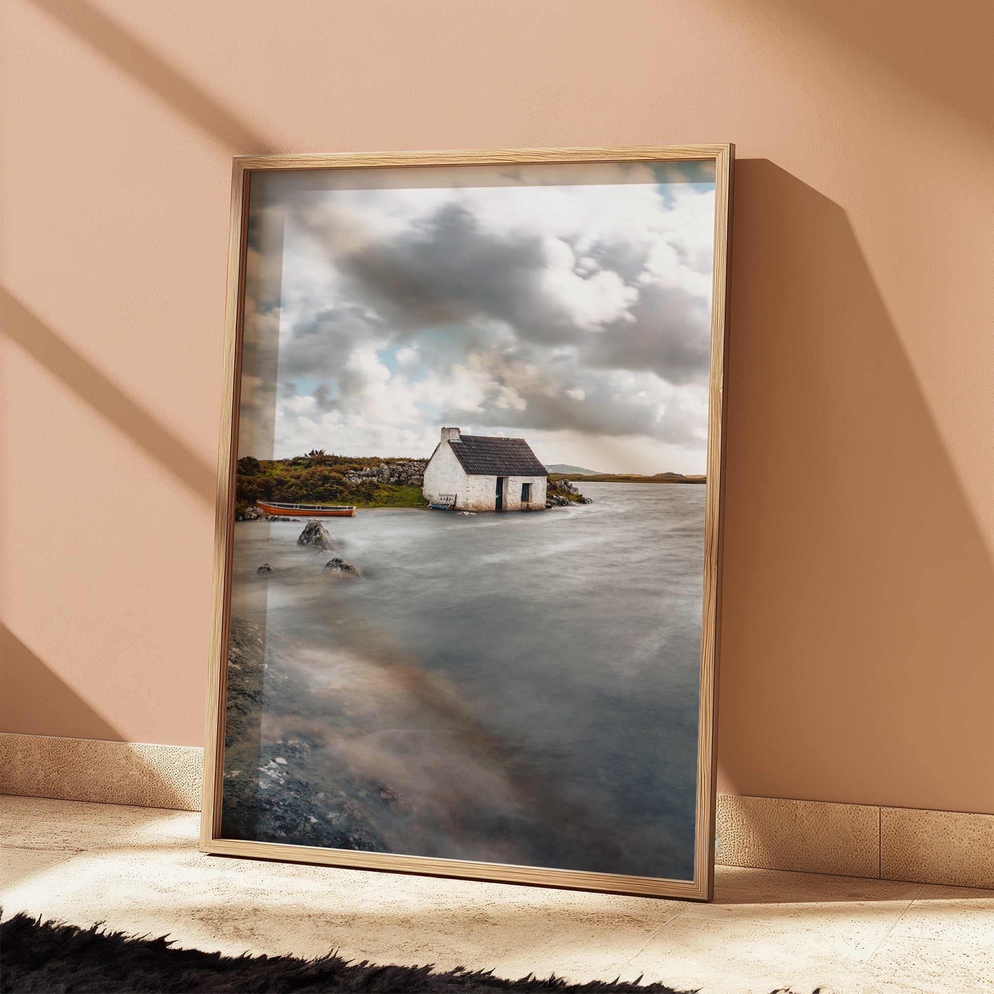 Coastal print of fisherman’s hut with golden and blue tones
